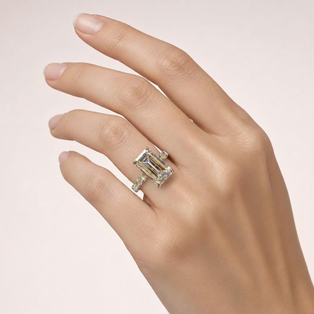 Emerald-cut ring on hand