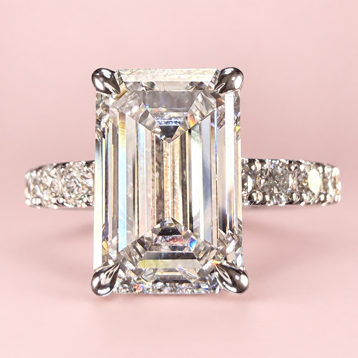 Emerald-cut ring with pink background