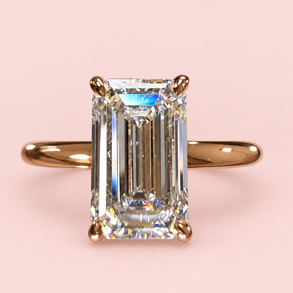Emerald-cut solitaire on pink