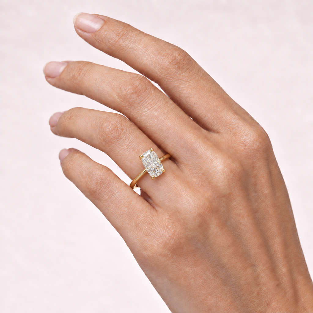 Hand wearing elongated cushion-cut solitaire