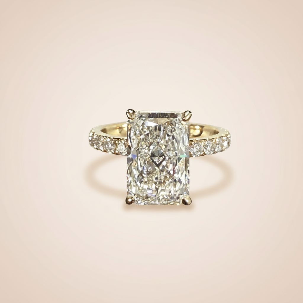 Radiant-cut yellow gold engagement ring side view