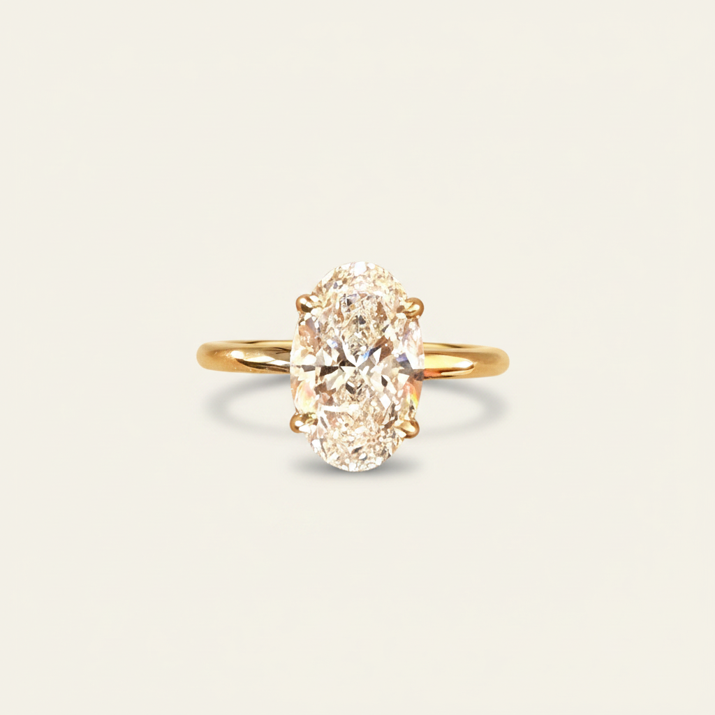 Yellow gold oval engagement ring angled view