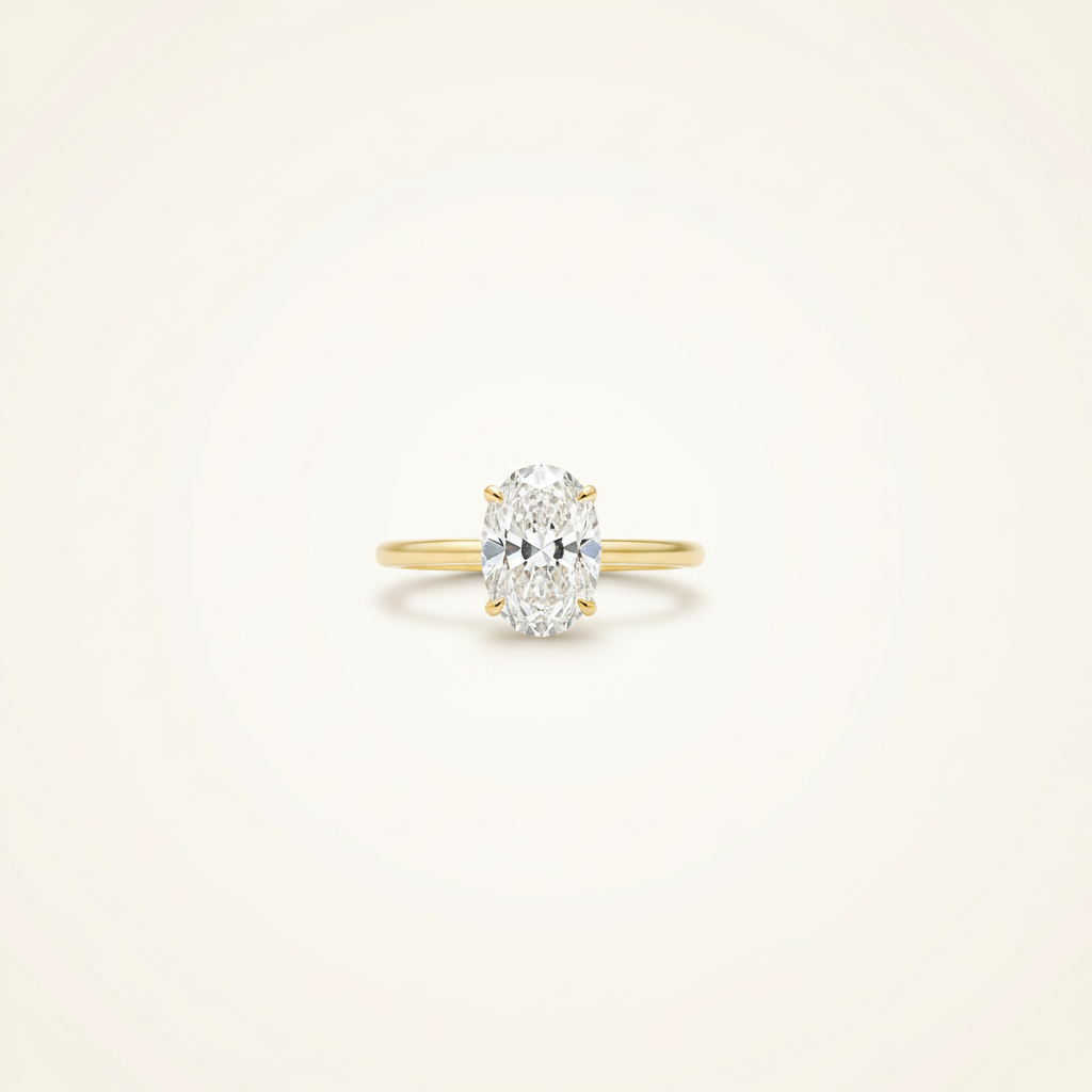 14K yellow gold oval ring studio view