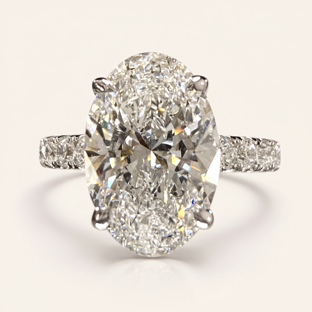 3.78ct oval lab-grown diamond ring on blush studio background