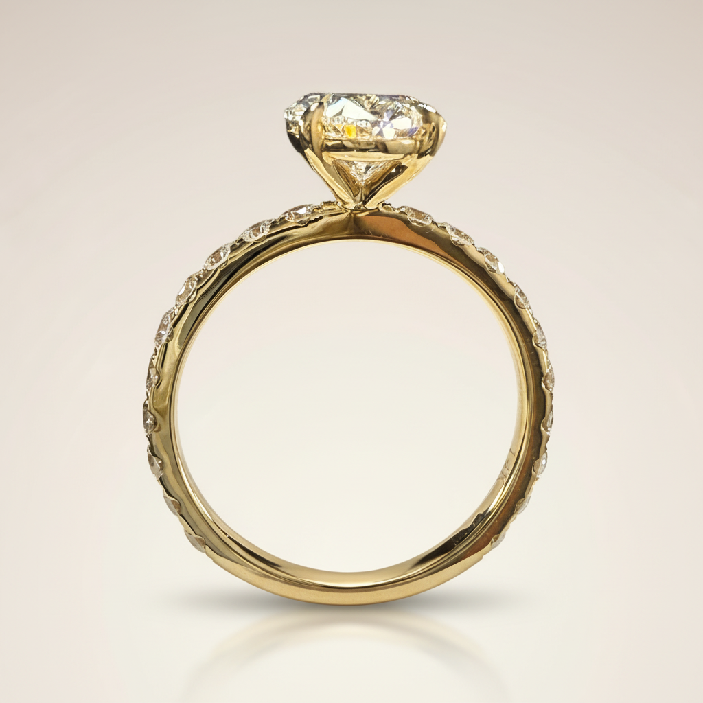 Yellow gold oval engagement ring angled view