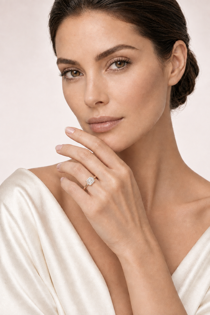 Model wearing emerald-cut solitaire