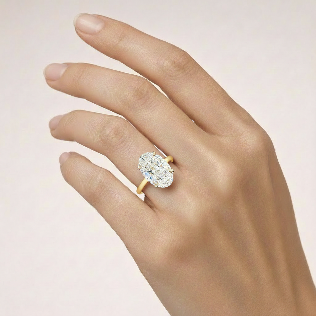 Oval solitaire on hand