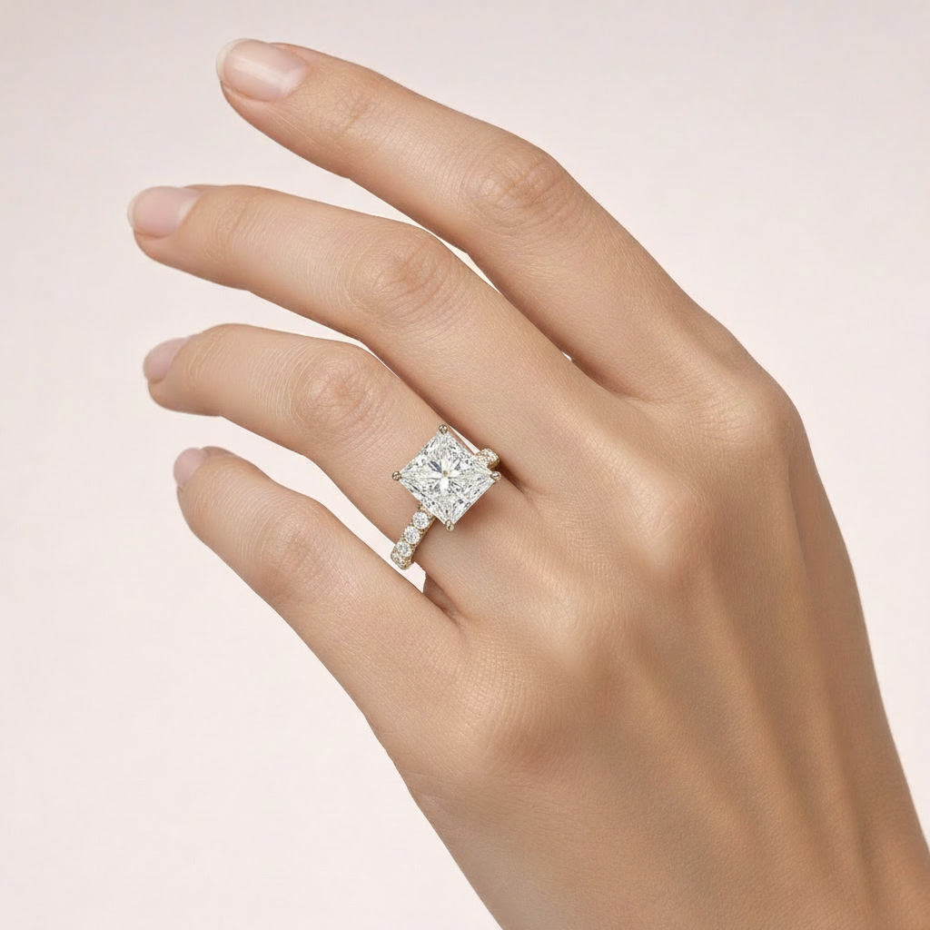 Princess-cut engagement ring on hand