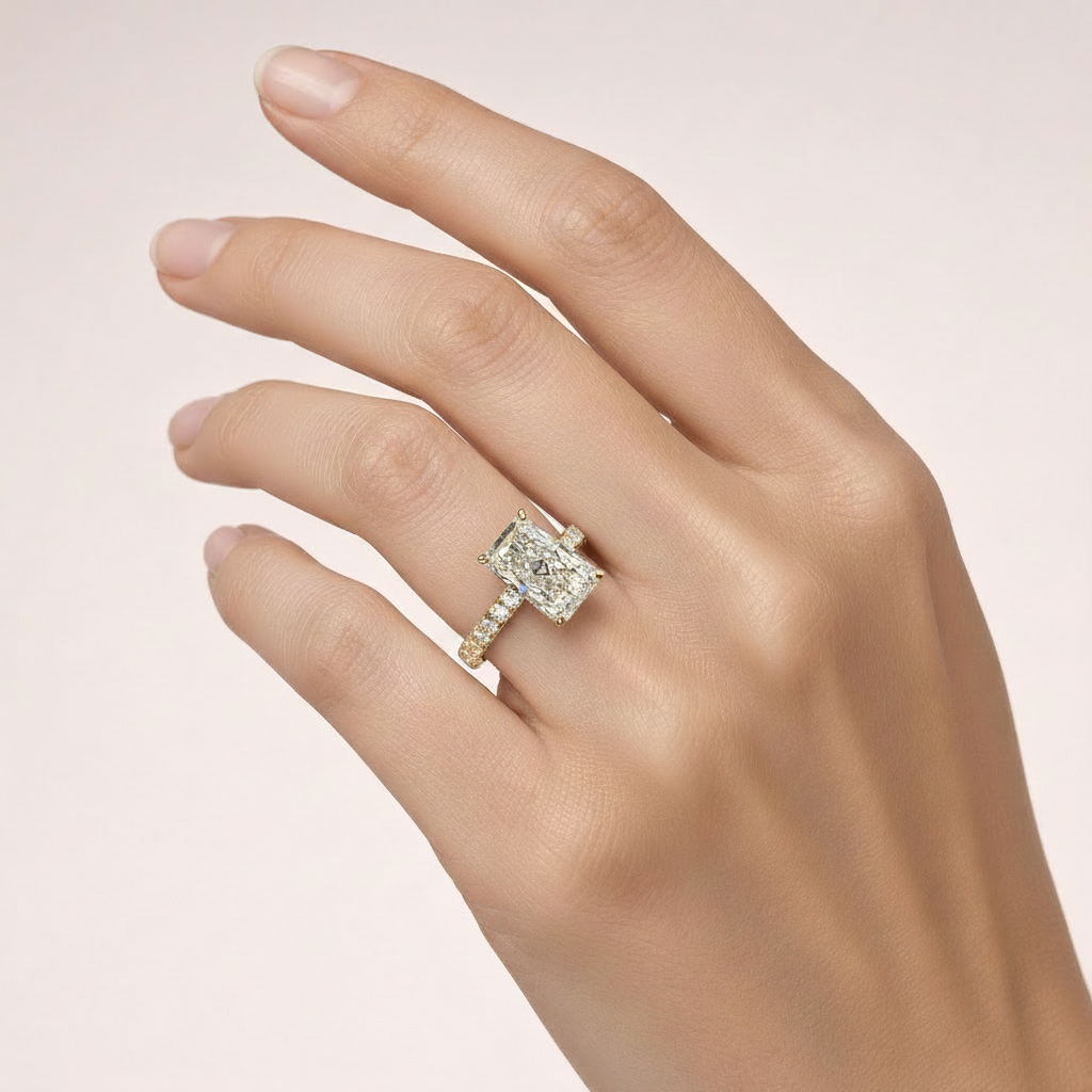 Radiant-cut ring on hand