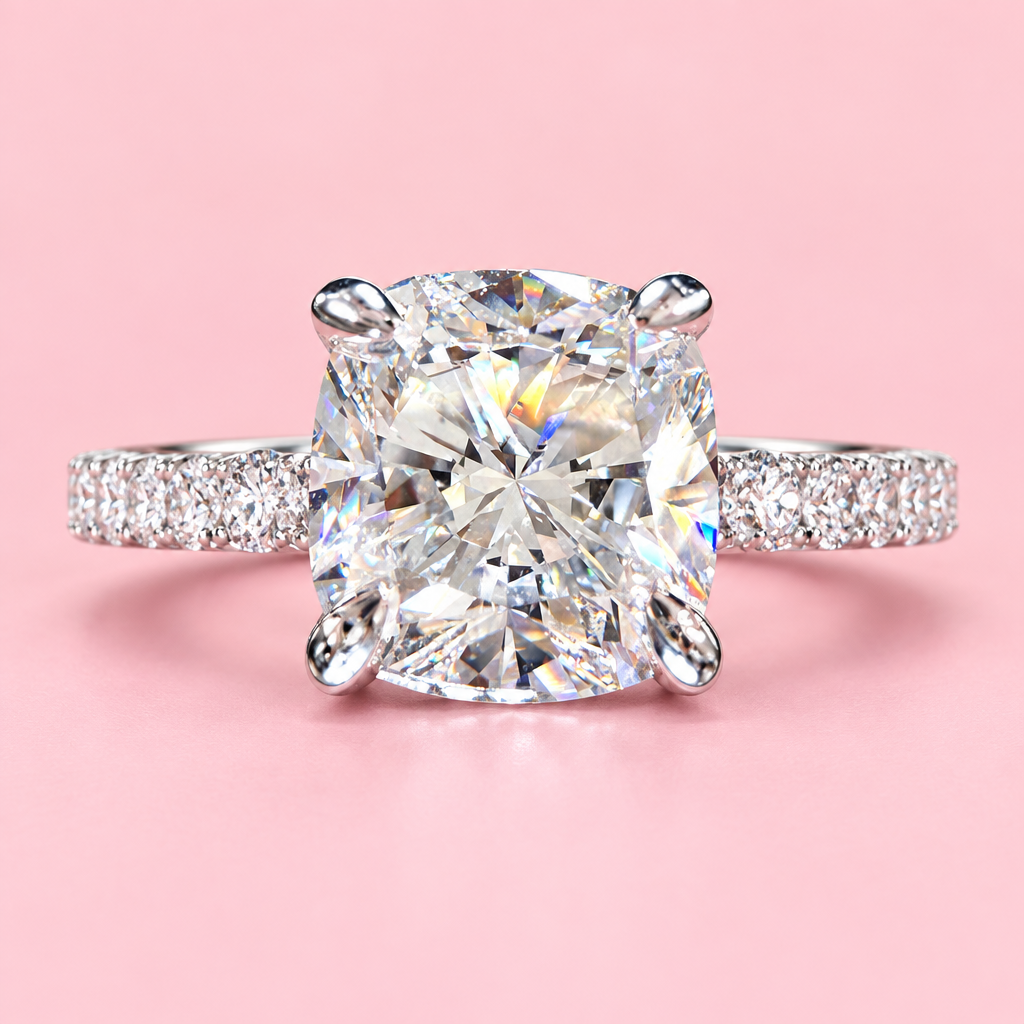 Front view of a 1.50ct cushion-cut lab diamond engagement ring with a 14K white gold pavé band.